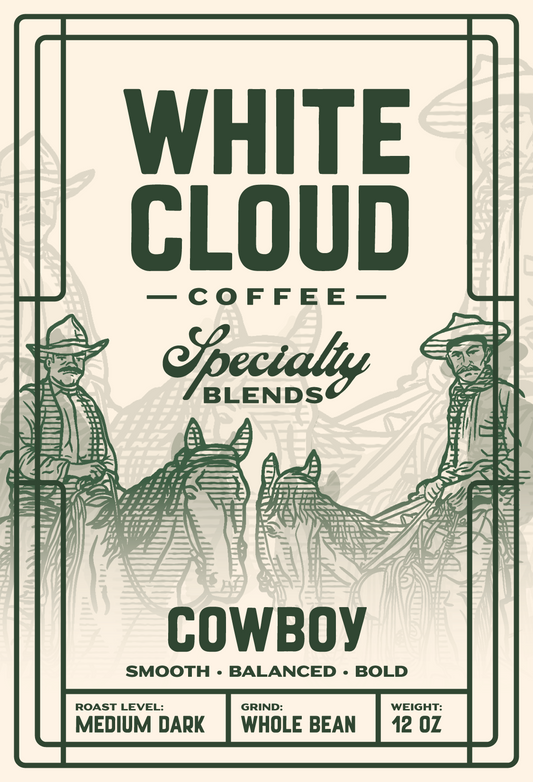 White Cloud Coffee Cowboy specialty blend bag with horseback riders illustration