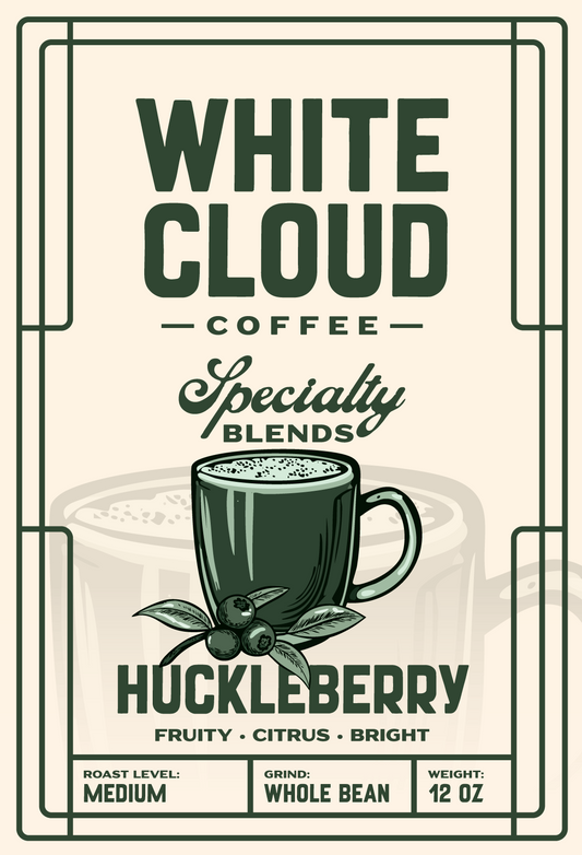 Huckleberry flavored medium roast from White Cloud Coffee, mug and berries artwork