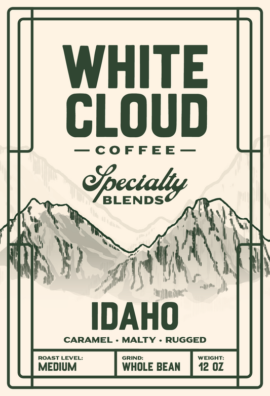 White Cloud Coffee Idaho specialty blend bag with mountain range illustration