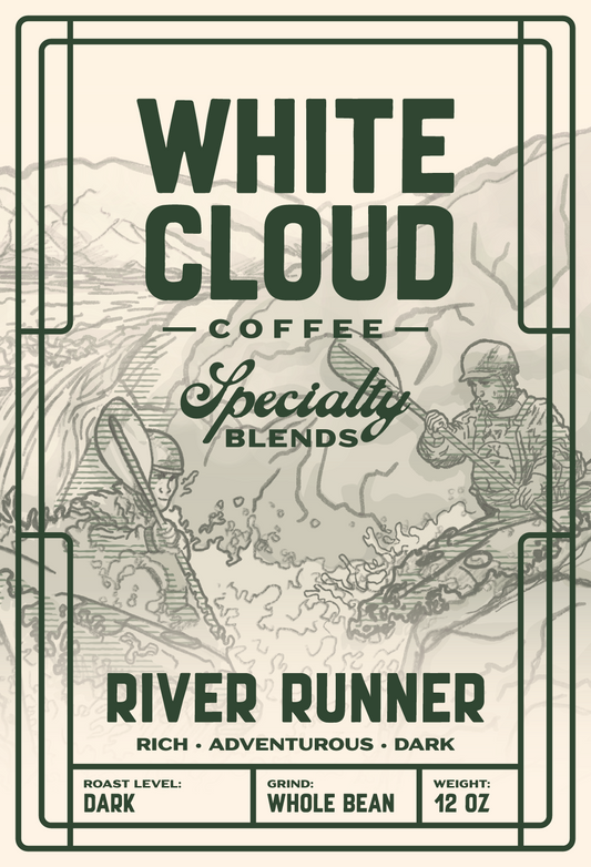 White Cloud Coffee River Runner dark roast bag with whitewater kayaker illustration
