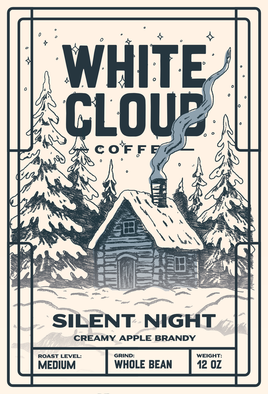 Silent Night apple brandy holiday coffee from White Cloud Coffee, snowy cabin artwork