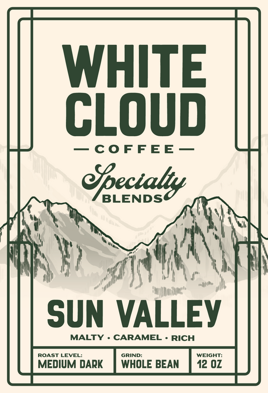White Cloud Coffee Sun Valley specialty blend bag with mountain peaks illustration